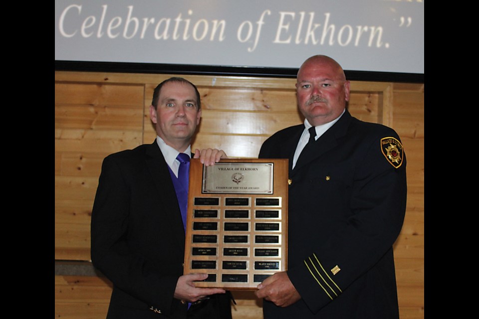 Citizen of the Year was presented to Blaine Rhodes, nominated by Wallace District Fire dept. Stn. 2. Presenting Rhodes with his award is Kevin Tutthill, LUD representative.