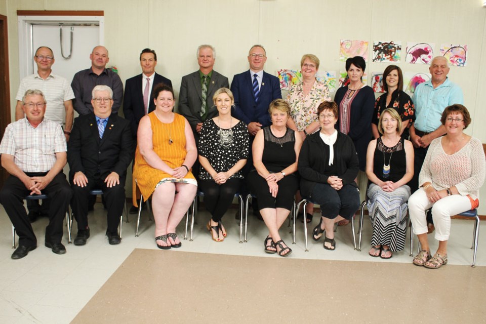 Fort La Bosse School Division long-serving staff members are awarded service pins Thursday, June 7 at the annual Recognition Banquet held in Oak Lake. Years of service ranged between 10 years and 40 years for teachers, caretakers, bus drivers, educational assistants, other support staff, board members and division office staff; (Back row l-r) Curtis Smith, Mark Keown, Howard Hole, Don Nahachewsky, Barry Pitz, Kim MacKenzie, Teresa Sanheim, Beth Norrie, Randy Kalynuk; (front l-r) Vaughn Wilson, Craig Russell, Rhonda Schindler, Tara Pitz, Patti Paull, Bonnie Girardin, Terri Dryden and Michelle Gervin.