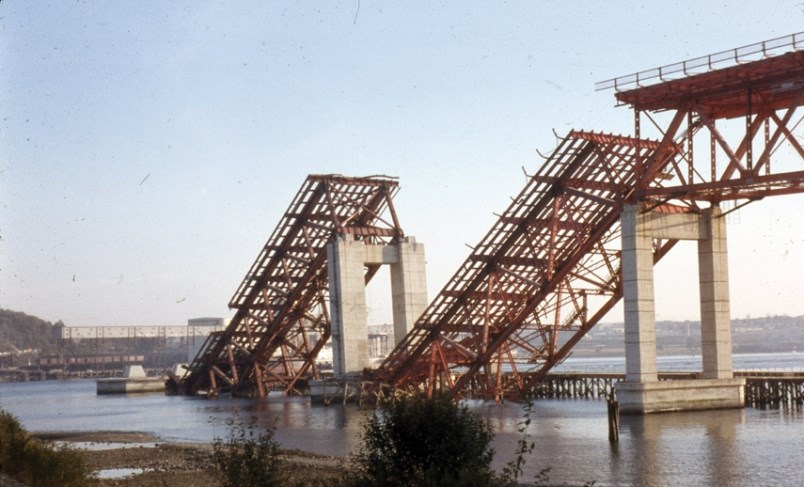 Two spans of the Second Narrows Bridge sit stuck in Burrard Inlet following the bridge’s collapse during construction on June 17, 1958. Eighteen men died in the collapse and another was killed days later while diving to recover a body.
