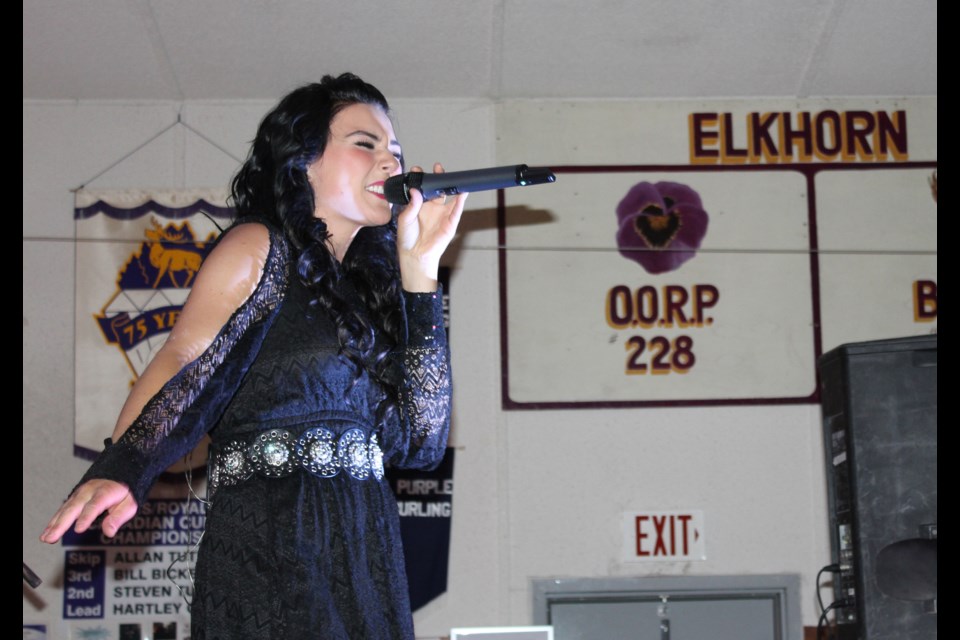 The rising star just seemed to slide right back into her old life, playing at the Elks Hall, visiting with old friends, and cheering on her Aunt Leona who also performed that night.