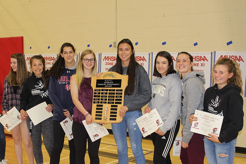 Dennita Cameron (middle right) and members of the senior girls’ basketball team shared the Ultimate