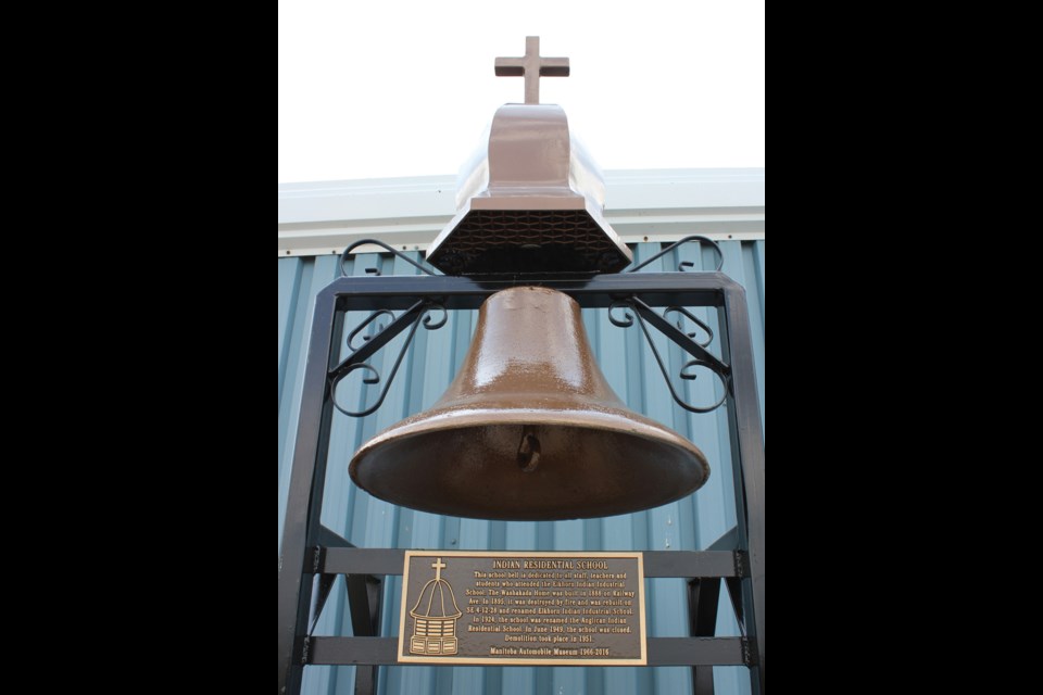 The bell from Elkhorn’s residential school has been restored and mounted at the entrance to the community’s Antique Auto Museum.