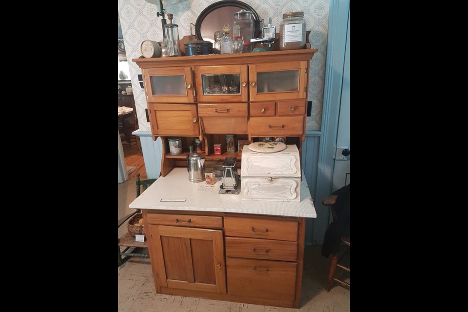 Hoosier cabinet of the late 19th century style in the Pioneer Home Museum.