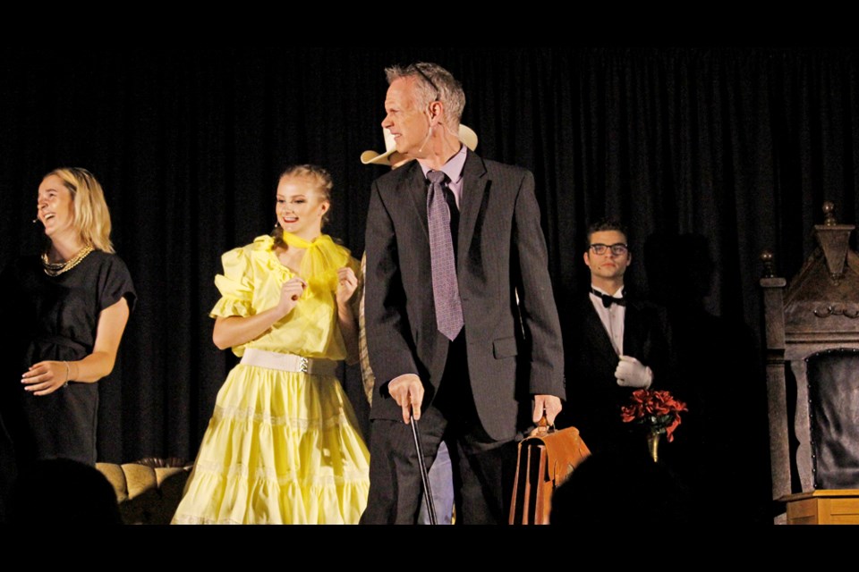 Virden Lawyer Jeff McConnell plays Languid Treacle (aged lawyer) in “Where There is a Will”, Megan Nahachewsky (in yellow is Grace Brash), Giordy Giannico (Shivers the smooth and deceptive butler) and Tori Eilers (Mary Trite). Family are gathered to hear who will inherit the estate of their late rich relative.