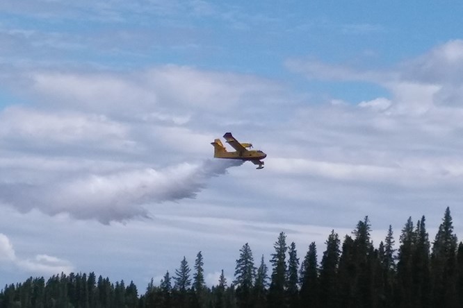 Four water bombers, like this one seen practising last Canada Day at Paint Lake, are currently deplo