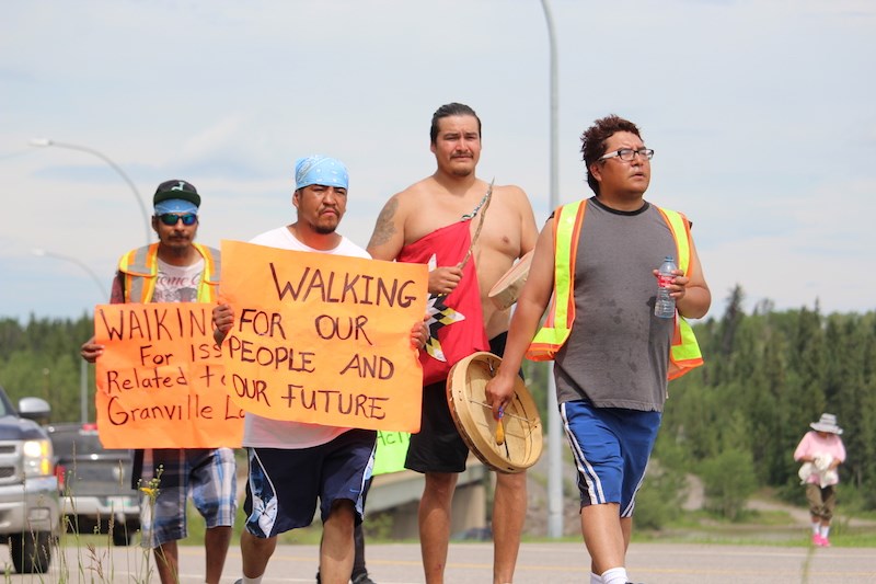 David Bighetty (far right) arrived in Thompson July 7 after walking over 200 km from his starting po