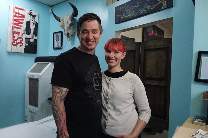 Jasyn Lucas and Nikki Brightnose in the tattooing area of their Selkirk Avenue business The Gift of