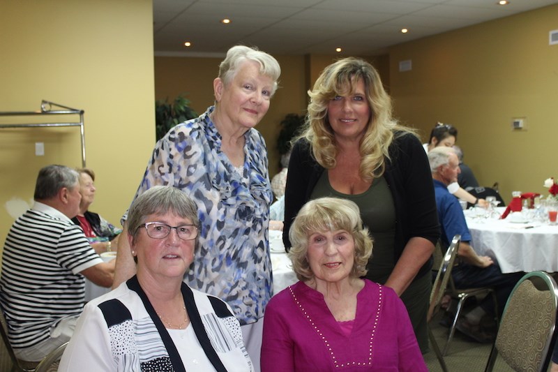Stella Locker (bottom right) poses for photo with friends and family during her 85th birthday celebration at the Mystery Lake Hotel on July 10. Clockwise from bottom left: Norma Howitt, Judy Kolada and Locker’s daughter Susan Buckle.