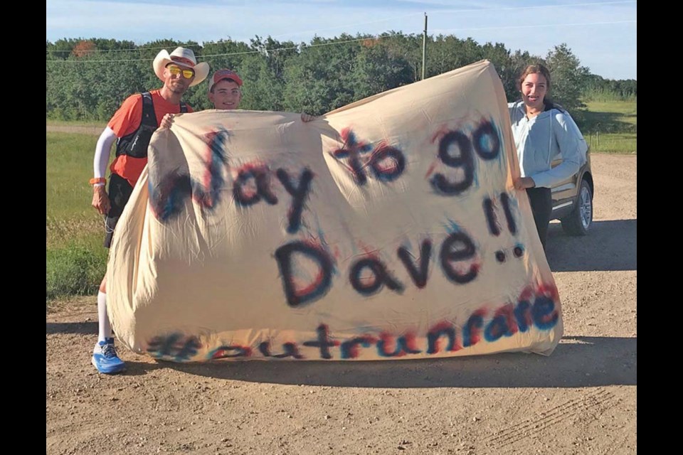 David Proctor (l) greeted by the Scharff kids Cade and Dannika on the Trans-Canada.