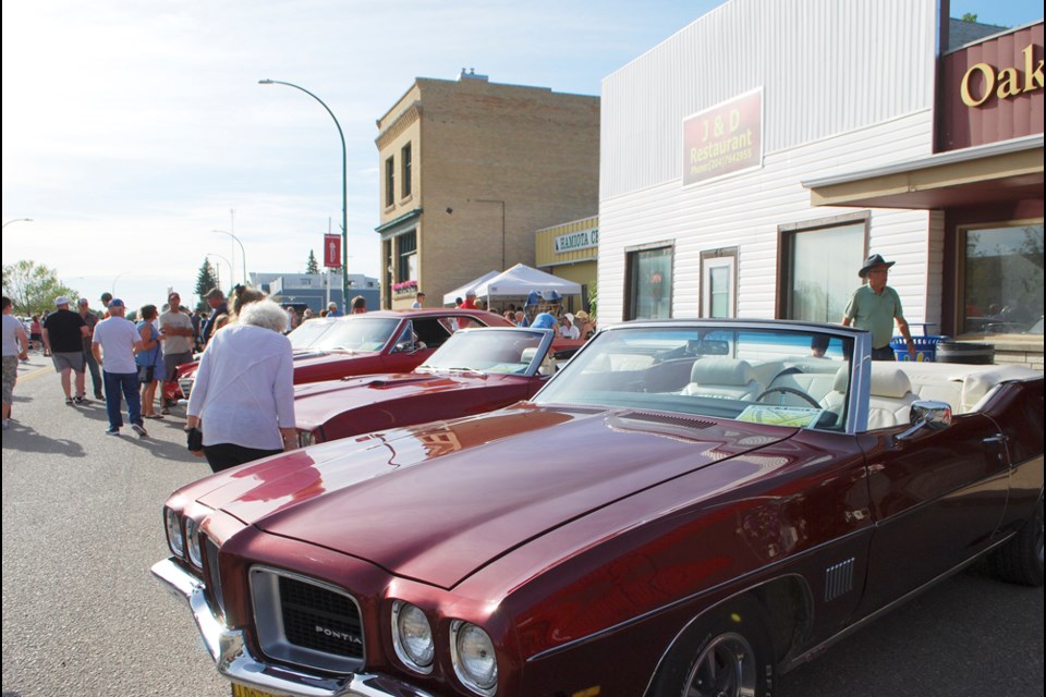 The Pontiac Lemans, 1971 vintage is one the red sports cars displayed by Bill and Barb Gardham of Crandall at the Hamiota Annual Show’n Shine, Wednesday evening, July 18.