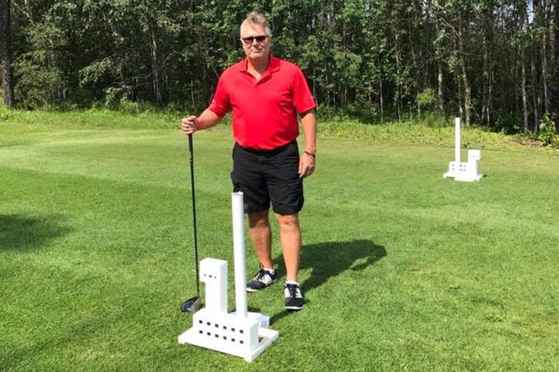 Event organizer Kelly Davis designed and built unique tee markers for the Thompson Golf Club’s 50th