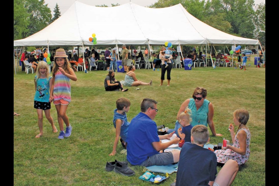 There was a party-like atmosphere at the Corex community kick-off barbecue on Thursday. Hundreds of people enjoyed a free lunch while kids played, munched and danced on the grass at Victoria Park.