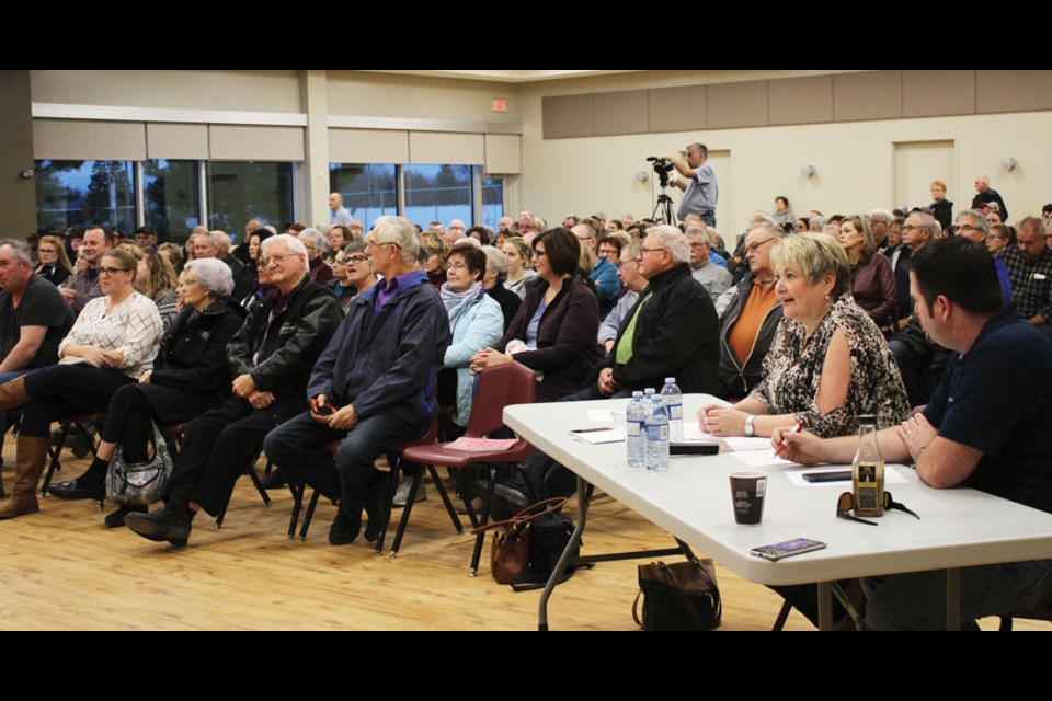 It was standing room only at the Candidates’ Debate in Virden, moderated by Paula Brazil (r) of the Virden Community Chamber of Commerce.