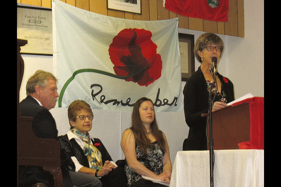 Sandy Heaman (r), the guest speaker at Ellkhorn’s Remembrance Day Heaman shares stories of two uncles who served - one in WW II and another during the Korean War.