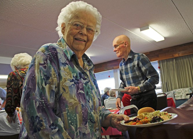 Christmas Dinner is served at Princess Lodge, Dec. 20. Joyce Heaman has a plate of turkey and all the trimmings.
