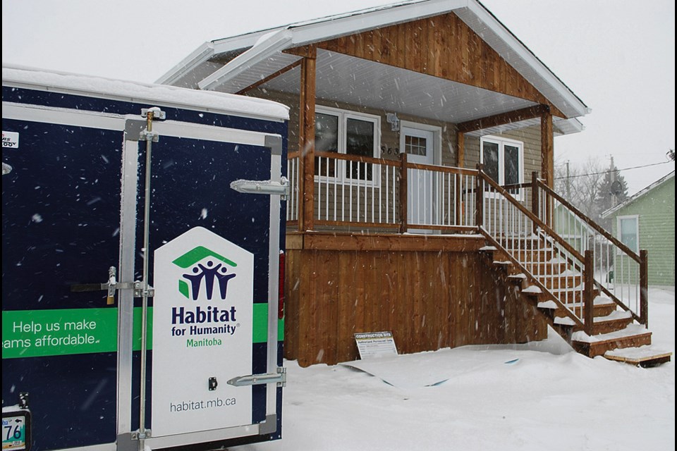 Falling snow on Jan. 6 emphasized the coziness of 563 Lyons St. West, the newest Habitat for Humanity build in Virden.