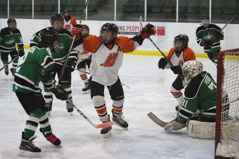 King Miner assistant captain Jacob Adams gives his team a 3−2 lead in the A division final of the 2019 Prince-Berscheid Memorial Hockey Tournament. This third period goal was the game winner, as the Miners would go on to beat the Norway House North Stars by a final score of 10−2.