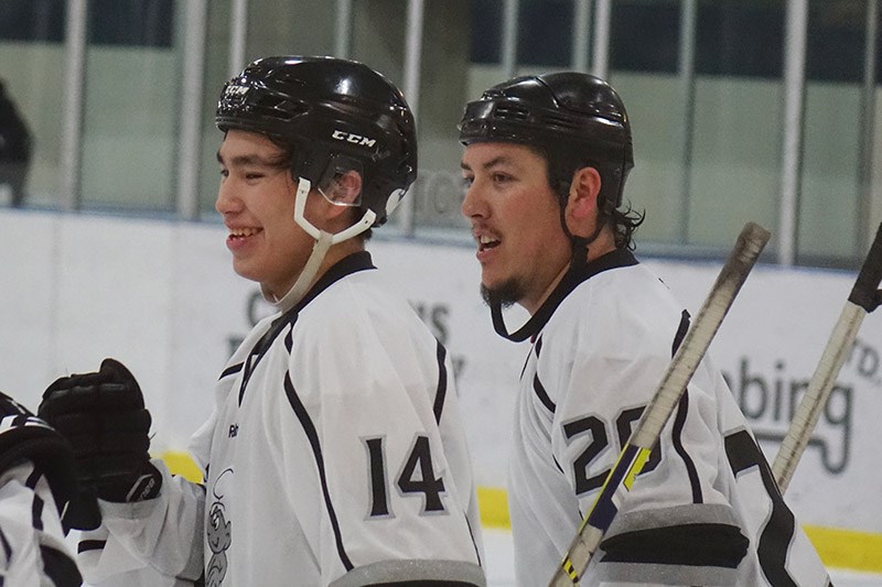 Preston McLeod, right, had four goals and Albert Sinclair, left, a pair as the York Landing Smurfs beat the Tataskweyak Cree Nation Blues 10-2 in the Keewatin Tribal Council hockey tournament senior division final at Thompson’s C.A. Nesbitt arena March 10.