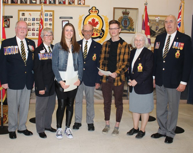 Gathered at Virden Legion club room for the Legion Poster and Literary Contest Provincial awards ceremony, (l-r) Zone Commander Mike Ramsden, District Commander Joan Wright, VCI Gr. 12 student and Poster winner Eduarda Gibbert, Past Zone Commander John Stowe, VCI Gr. 12 student and Literary winner Mitch Whittle, Secretary Treasurer Zone 26 Margaret James and Legion member Kelvon Smith.