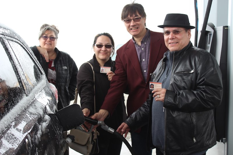 From left to right, Nisichawayasihk Cree Nation Coun. Jaqueline Walker, Vice-Chief Cheryl Moore, Chief Marcel Moody and Manitoba Keewatinowi Okimakanak Grand Chief Garrison Settee pose next to the pumps during the May 3 soft launch of NCN’s Thompson gas bar.