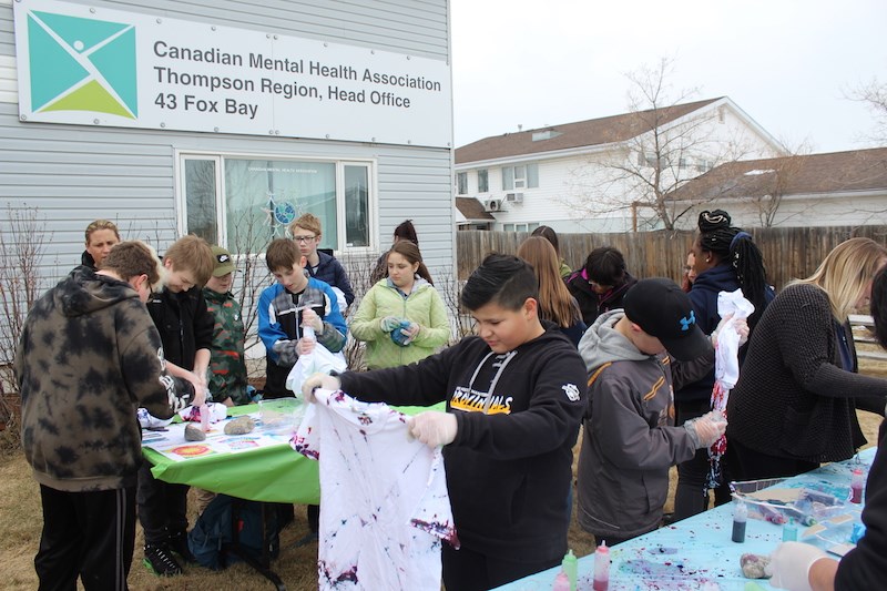 As part of this year’s mental health awareness week, students from Westwood and Riverside schools made tie-dye t-shirts and painted rocks outside Thompson’s Canadian Mental Health Association headquarters May 7.