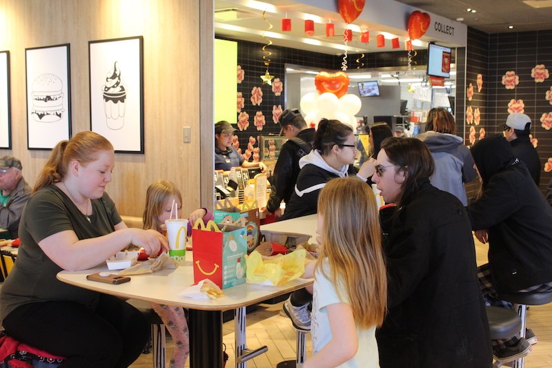 Thompson residents enjoy lunch at McDonald’s during McHappy Day May 8.