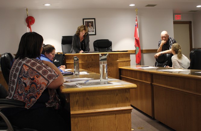 Town of Virden Councillors and staff in the Council Chambers following the 2019 Budget Public Hearing, May 2; in view are (l-r) Anna Macksymchuk - Chief Financial Officer, Councillor Tara Cowan, CAO Rhonda Stewart, Mayor Murray Wright with Deputy Mayor Tina Williams. Grant Gardiner and Karel Munchinsky were also in attendance; Travis Penner was absent.