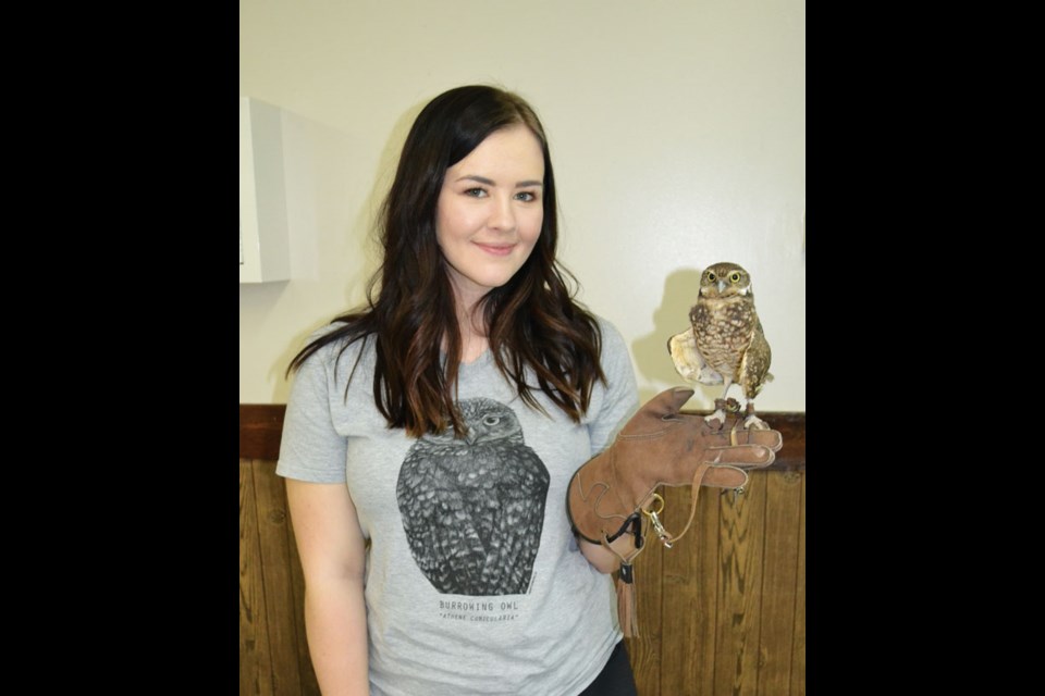 Cassidy Howell and her sidekick Koko the Owl.