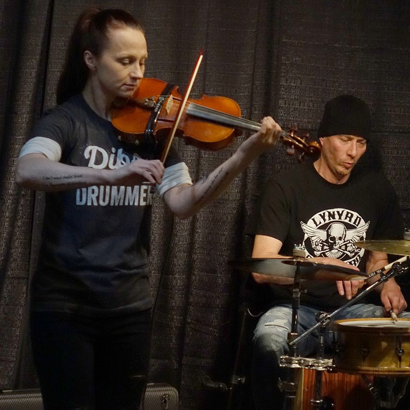 Unstrung Heroes – Jennifer Nyhof and Kory Wickdahl – performed at a May 24 reception where the Nicke