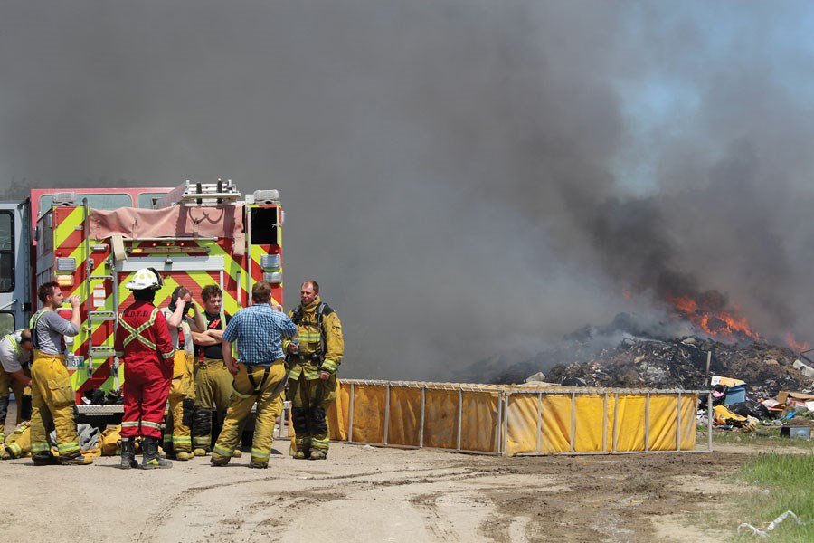 WDFD firefighters at the scene of a noon hour fire call to Kola landfill.