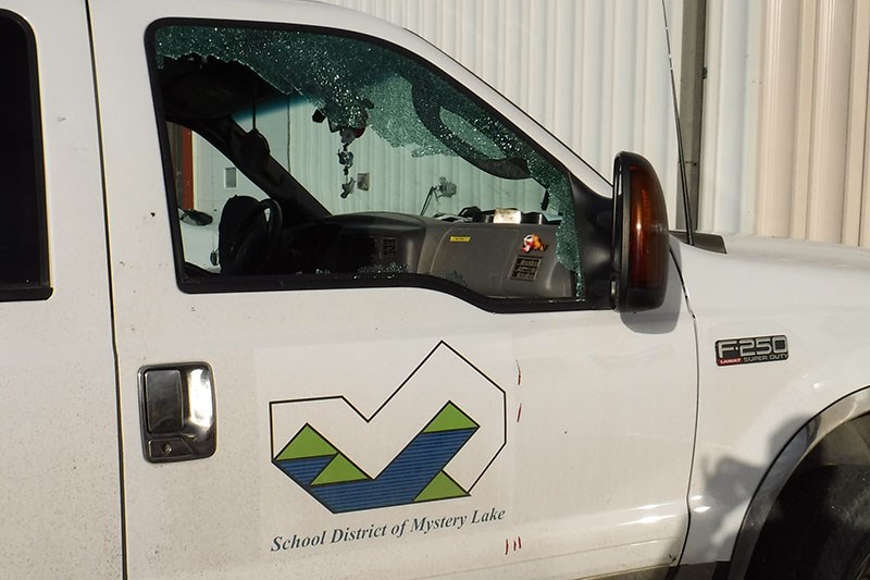 Eleven School District of Mystery Lake pickup trucks were damaged sometime July 2-3.