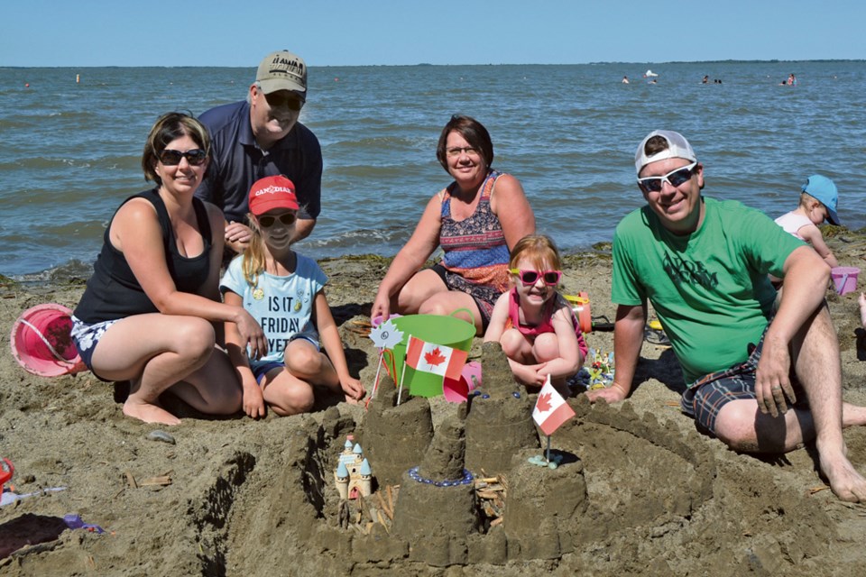 Three generations of Craig and Leeanna Russell's family of Virden joined forces in building a medieval sand castle complete with ramparts, towers, and a moat. They and many other teams were at Oak Lake Beach for the community’s sand castle building contest on Canada Day.