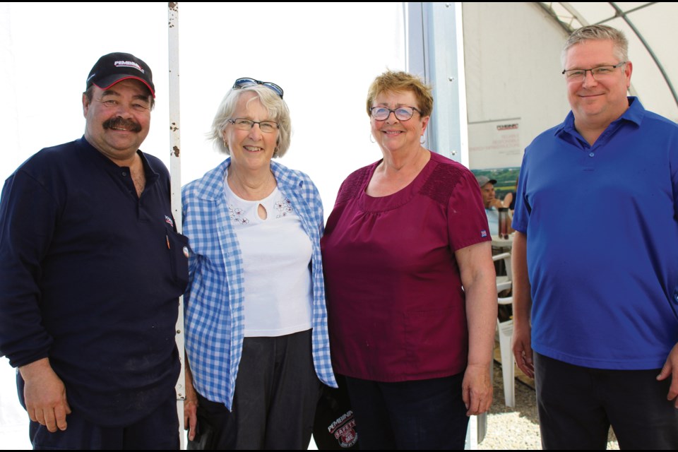 Pembina Pipelines Area Manager Trent Forsyth, Food Cupboard representatives Shirley Gibson and Myrna Bisson with Pembina’s Operations Manager Mike Edgar from Ontario.