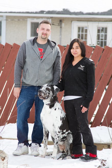 Kevin Loder, Cali the cow dog and Robyn Shlachetka in April 2016.