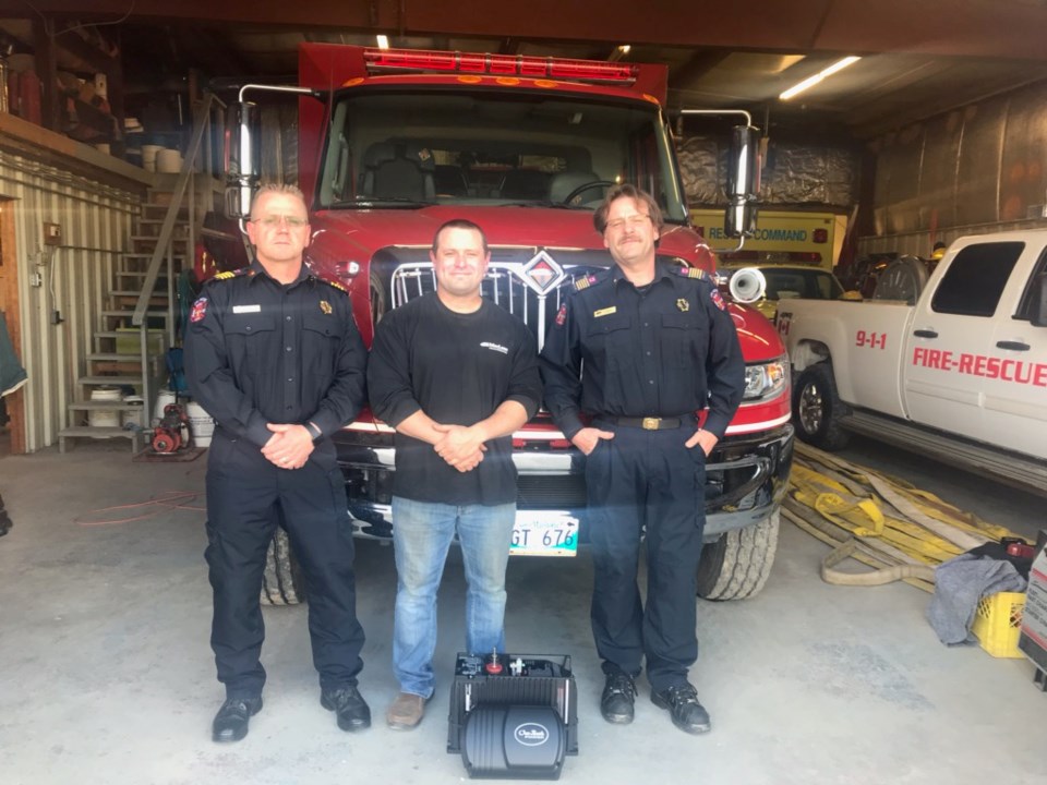 From left to right, Snow Lake Lake Volunteer Fire and Rescue Department Deputy Chief Bernard Fourie,