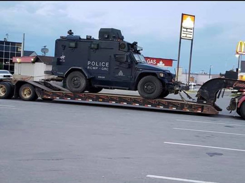 Aaron Lapensee posted photos of armoured RCMP vehicles in Thompson en route to Gillam in the Faceboo