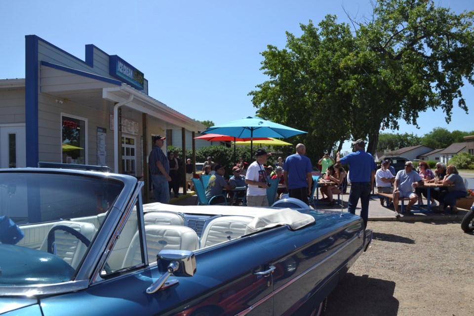 Ice Cream Island was busier than usual after three dozen classic cars pulled into the parking lot on Monday.