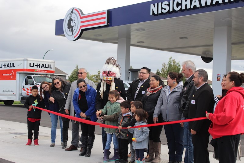 Members of Nisichawayasihk Cree Nation, in addition to Thompson provincial election candidates Danielle Adams and Kelly Bindle, took part in a ribbon-cutting ceremony Sept. 6 for the First Naion's gas station, which began operations in May.