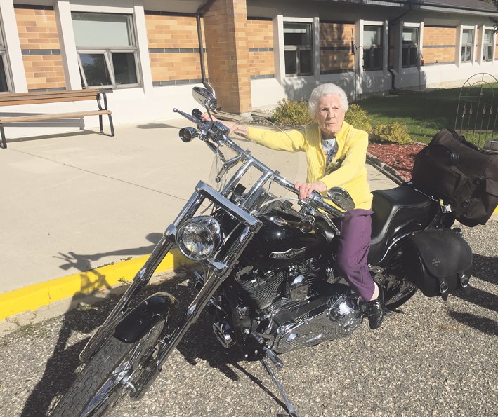 Coming 100 years young on Oct. 21, Lily Bowles needed very little help to get on her great nephew’s motorcycle.