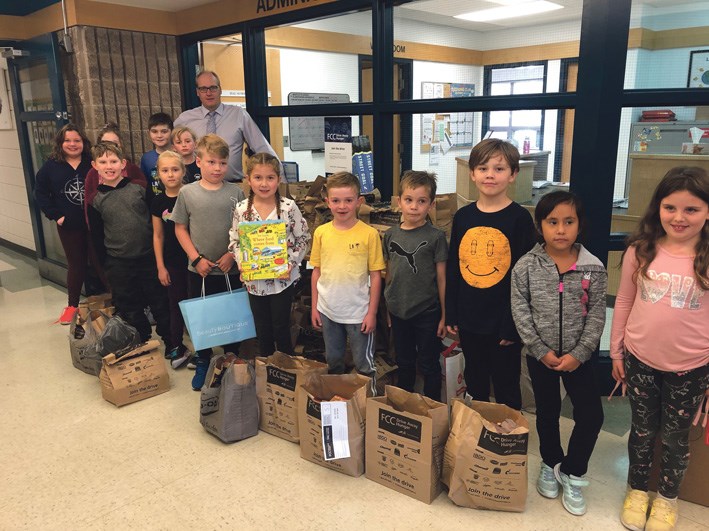 Mary Montgomery School, K - Gr.4, collected 418 lbs. of food and $160 cash.