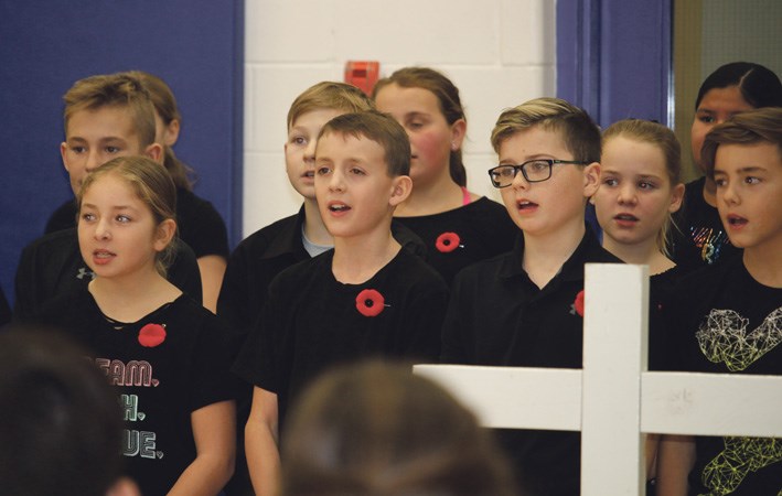 Members of the Gr. 5 class at Virden Junior High sing a touching Remembrance Day anthem.