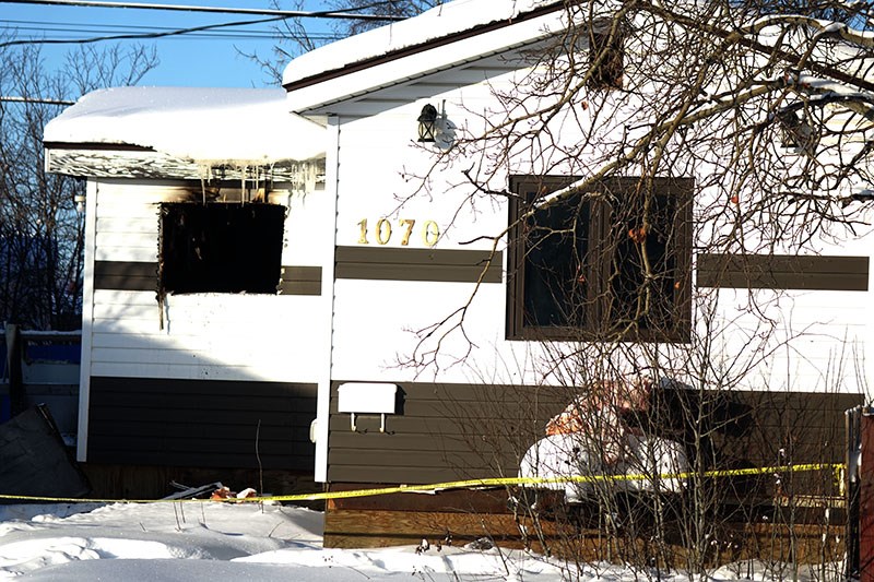 A resident of Ospwagon Road who saw a Cree Road mobile home burning Dec. 23 entered the building thr