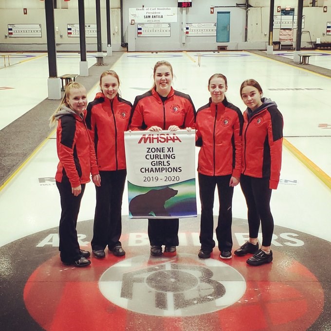 The R.D. Parker Collegiate girls’ curling team, seen here after winning the Zone 11 championship in