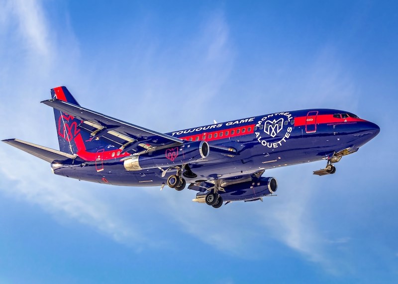 A Nolinor Aviation plane decked out in the colours and logo of the CFL’s Montreal Alouettes touched