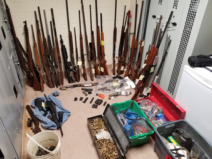 Weapons, ammunition seized in joint police raid near Melita April 18.