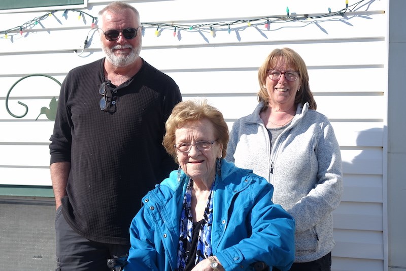 Pat Leahy, left, and Anna Leahy right, with longtime Thompson resident Norma Leahy, centre, who cele