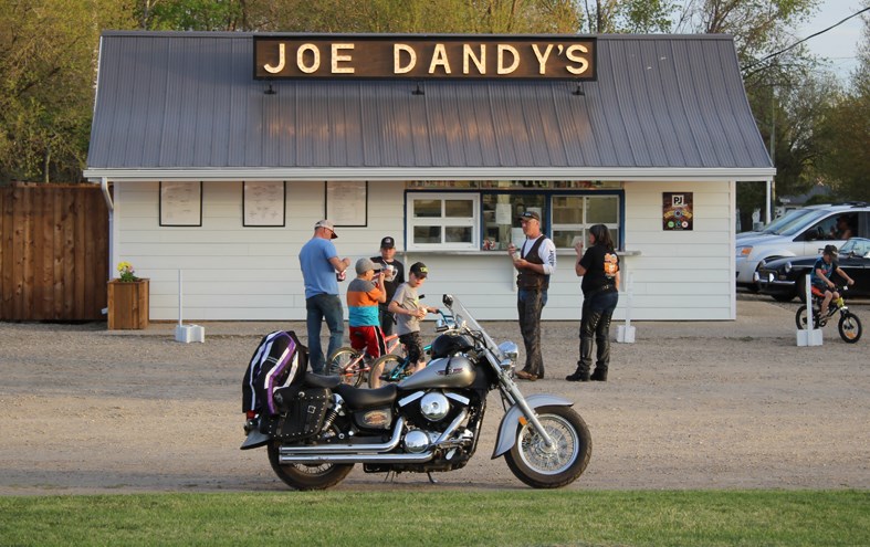 Customers at Oak Lake's Joe Dandy's on a beautiful May evening.