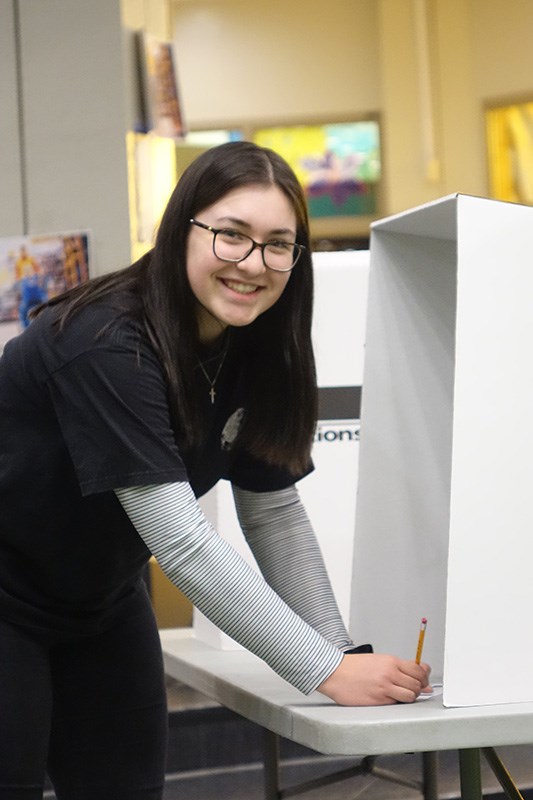 R.D. Parker Collegiate Grade 12 student Hannah Lowen casts her vote for valedictorian in the high sc