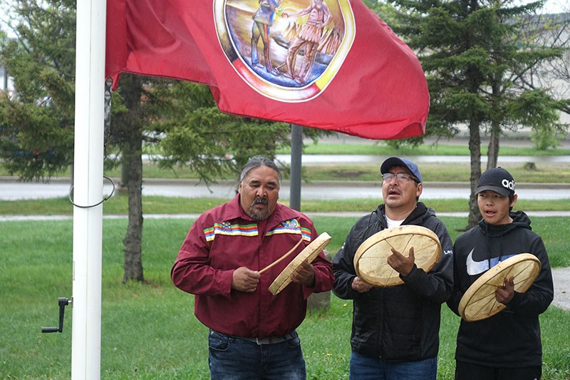 Drummers perform before the raising of the Manitoba Keewatinowi Okimakanak flag at the Thompson RCMP detachment June 21.