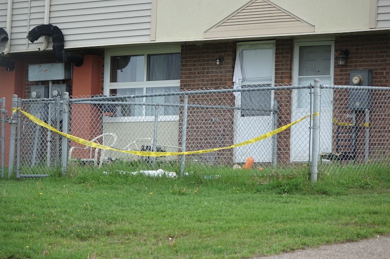 Yellow tape at a townhouse near the corner of Purdue Avenue and Brandon Crescent is related to the investigation of a sudden death at Thompson General Hospital July 5, Thompson RCMP say. The death is suspected to be the result of natural causes.